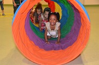 Students in a play tunnel 