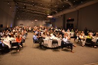 Students, teachers, and energy leaders pack a banquet room at COSI for the Youth Energy Celebration. 