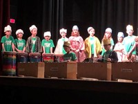 Third grade pupils perform