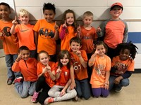 Students wearing orange
