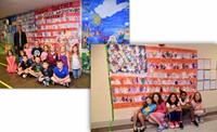 Students at Emerson and Hanby pose in front of colorful flags they created.