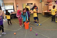 Robert Frost students participate in activities that highlight desired qualities through teamwork and discussion.