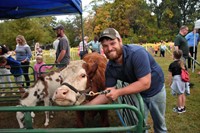 Cody Bush from Horse-N-Round with one of his cows