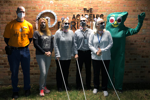 AEC staff and EOS teachers dress up for Halloween.