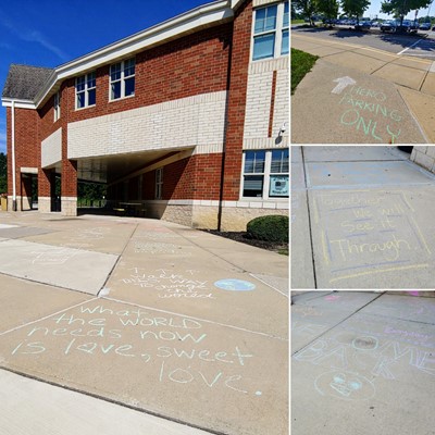 Positive messages and artwork at the entrance of Alcott Elementary.