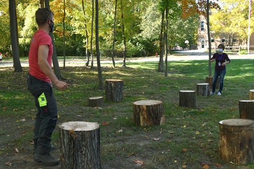 Russell Tree Experts donate tree stumps for outdoor classroom at Wilder.
